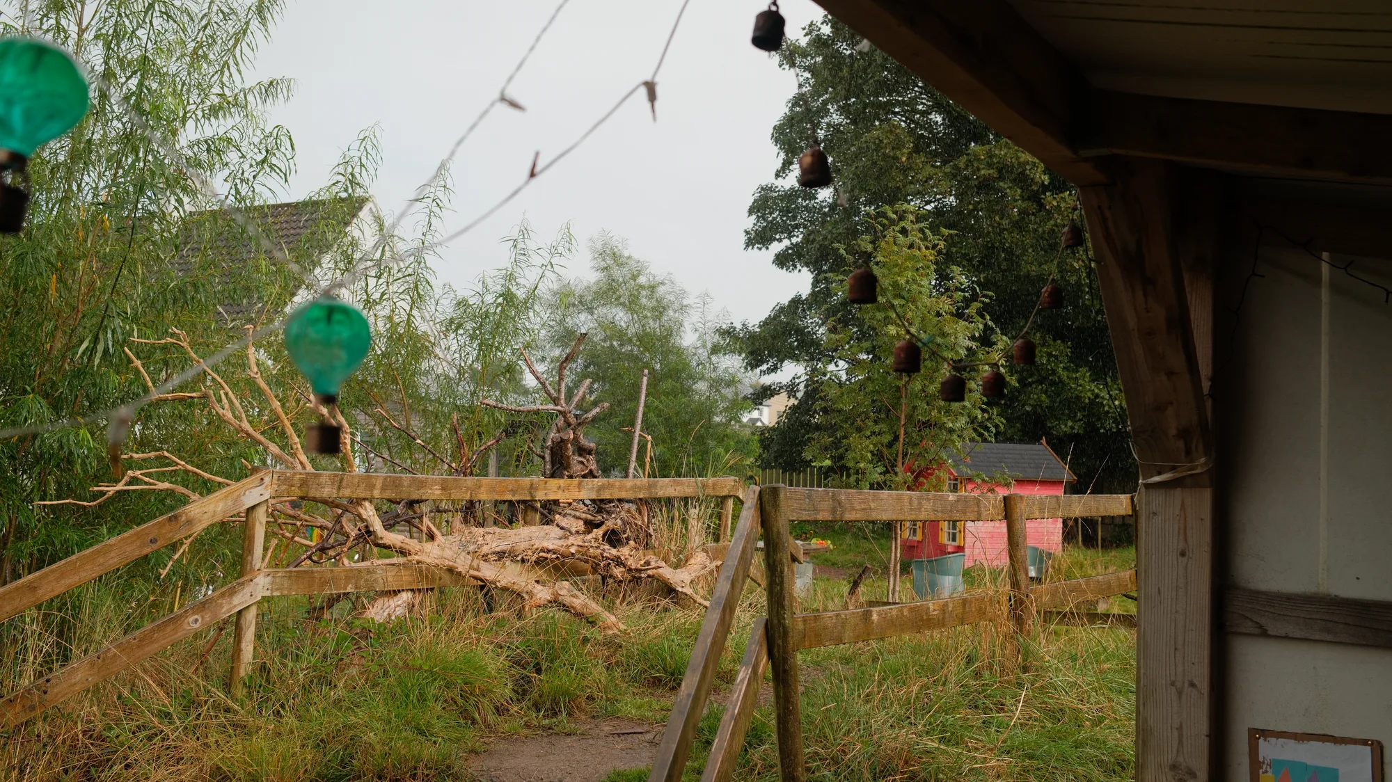 Paper lanterns above the garden structures